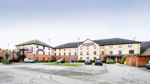 Premier Inn Chesterfield North hotel - view from the road showing lots of free parking spaces outside